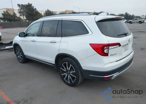 2021 Honda Pilot 2Wd Touring 8 Passenger z USA, uszkodzony, nr VIN 5FNYF5H90MB001707